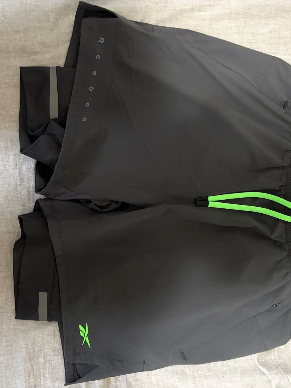 Reebok Men’s Black Athletic Shorts with Neon Green Accents